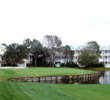 The sixth green at Lake Buena Vista Golf Course is nestled against water. 