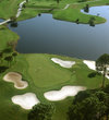 The par-3 16th hole on Disney's Palm golf course is entirely over water. 