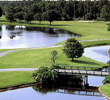 The par-4 17th hole on Disney's Magnolia golf course is a dogleg left around water. 