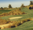 Steep, wooden-walled, whiskey barrel bunkers make up nine of the 36 bunkers at Mystic Dunes Golf Club near Orlando.