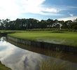 The eighth hole on Grand Cypress Resort's New Course is a long tricky par 4 with an approach that plays over a bern.