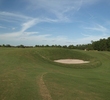 The second hole on Grand Cypress Resort's New Course is a reachable par 5 but you want to avoid the cavernous pot bunkers.