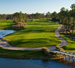 Tee shots away from the resort quickly return play to tranquil. Tall jetting pines along the fairway are joined by a series of undulating bunkers down the left side. But left is still the preferred route into the wide side of the green.