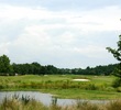 Celebration Golf Club's third hole is a par 3 over water.