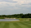 The first par 5 at Celebration Golf Club comes at the fourth, which wraps around water.