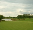 Celebration Golf Club's par-4 seventh hole wraps around water.