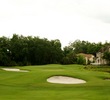 Celebration Golf Club's par-5 12th hole is a dogleg left to a green guarded by water on the right side.