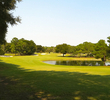 The par-5 14th on Mission Hill's El Campeon golf course plays downhill and doglegs right towards the green.