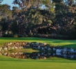A pond adds suspense to the par-4 13th hole on the Legends golf course at Orange Lake Resort in Kimmimmee, Fla. 
