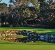 A pond adds suspense to the par-4 13th hole on the Legends golf course at Orange Lake Resort in Kimmimmee, Fla. 