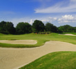 Large bunkers loom around and away from the green on the par-4 third at Bella Collina in Montverde, Florida.