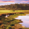 A sunset view of a green at International from ChampionsGate Golf Club.