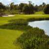 A view of a green with water coming into play at Stonegate Golf Club