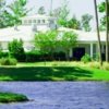 A view over the water of the clubhouse at Magnolia Plantation Golf Club