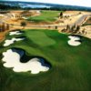 A view of a green surrounded by tricky bunkers at Bella Collina Golf Club