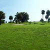 A view of a green protected by a sand trap at Fisherman's Cove Golf & Marina
