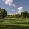 The elevated 14th green from El Campeon at Mission Inn is protected by multiple bunkers and a mature oak.