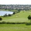 A sunny day view of a hole at Sanctuary Ridge Golf Club.