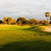 A sunset view of hole #18 at Remington Golf Club.