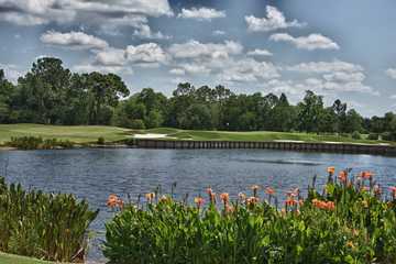 A view over the water of green #5 at Interlachen Country Club.