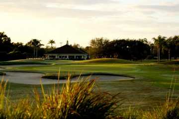 A view of green #9 protected by an undulating bunker at Forest Lake Golf Club.