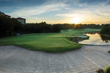 Sunset view of a green from The Reserve course at Orange Lake Resort